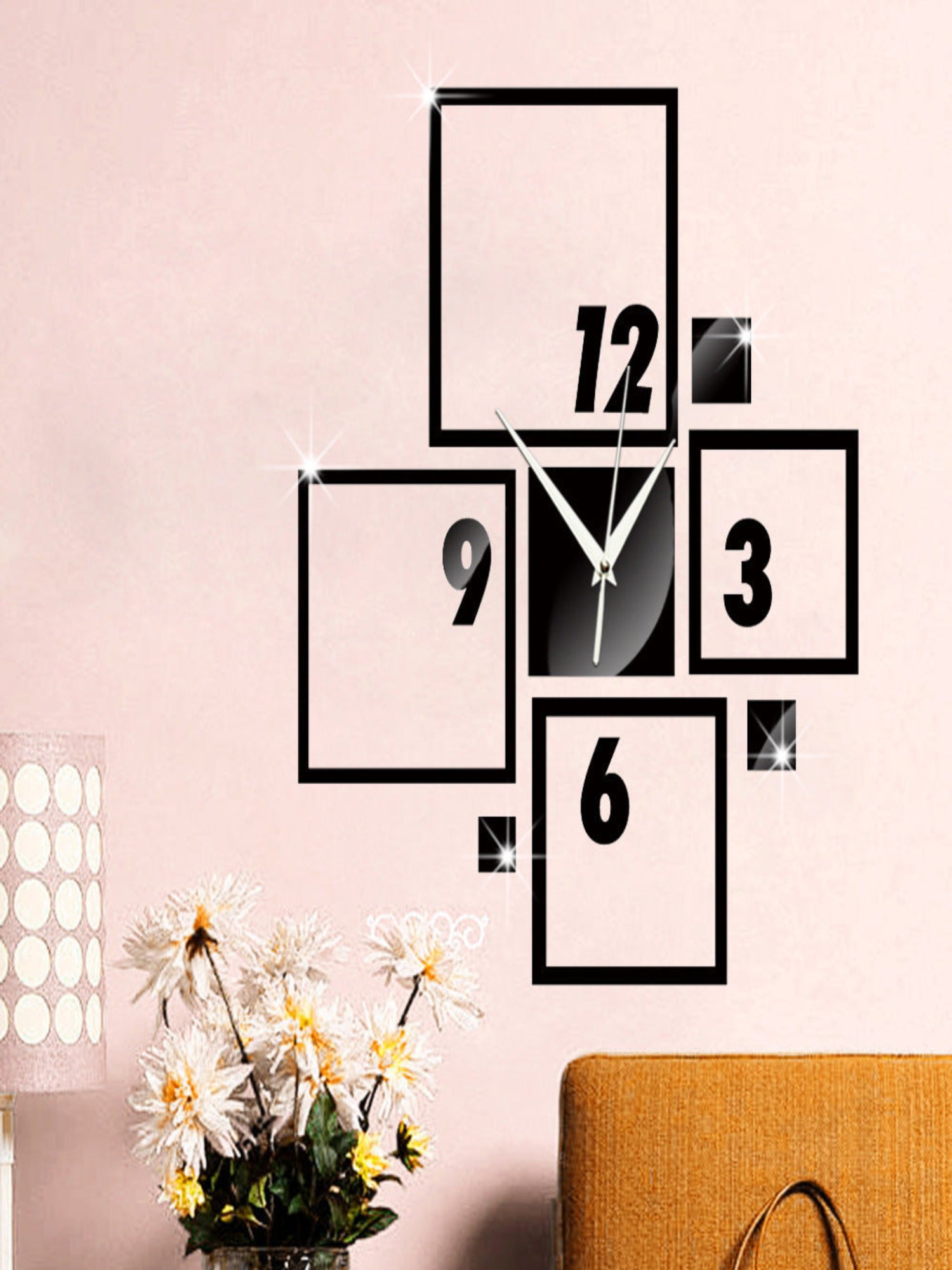 Modern acrylic wall clock decor with sleek design.