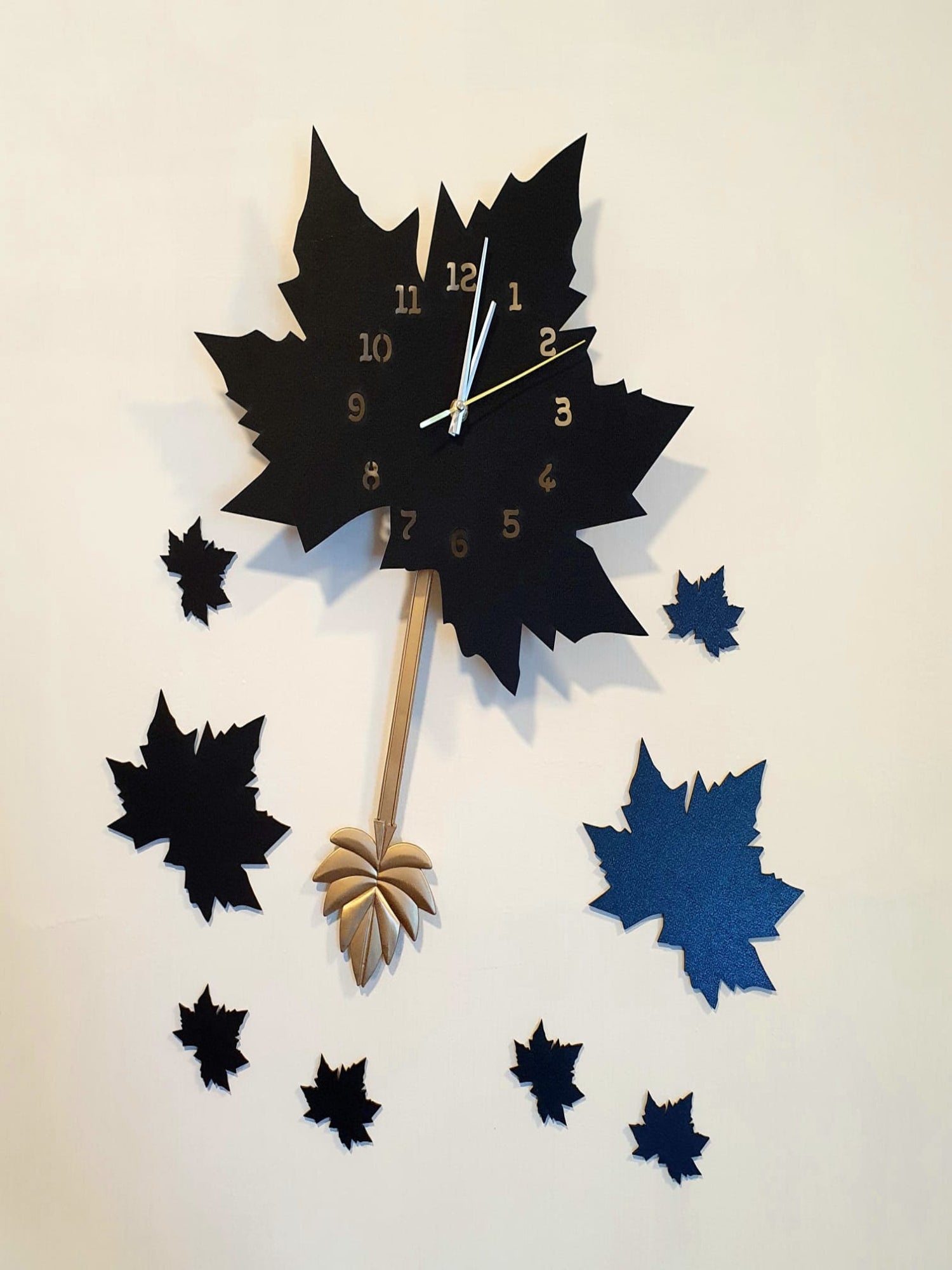 Black Maple Leaf Wall Clock with Pendulum - Image 1